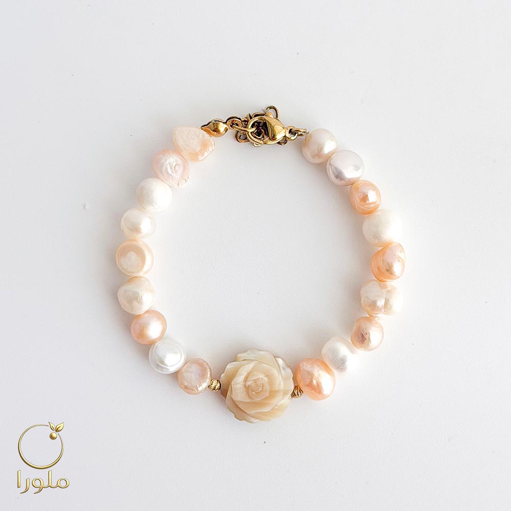 محصولPearl-bracelet-and-gold-shell-plaque-code-12001 دستبند مروارید پرورشی و پلاک صدفی با گوی طلا کد 12001دستبند مروارید پرورشی و پلاک صدفی با گوی طلا کد 12001