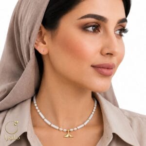 تن پوش گردنبند مروارید و صدف بامبو با پلاک دم وال طلا کد 11015