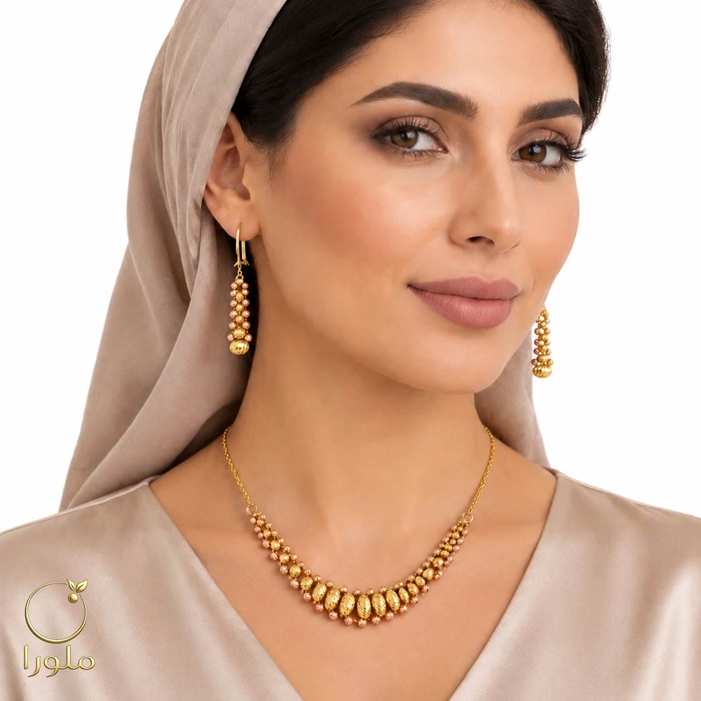 تن پوش نیم ست طلا مدل گوی تراش دار کد 27008 وزن 8.58 گرم اجرت 6 درصد